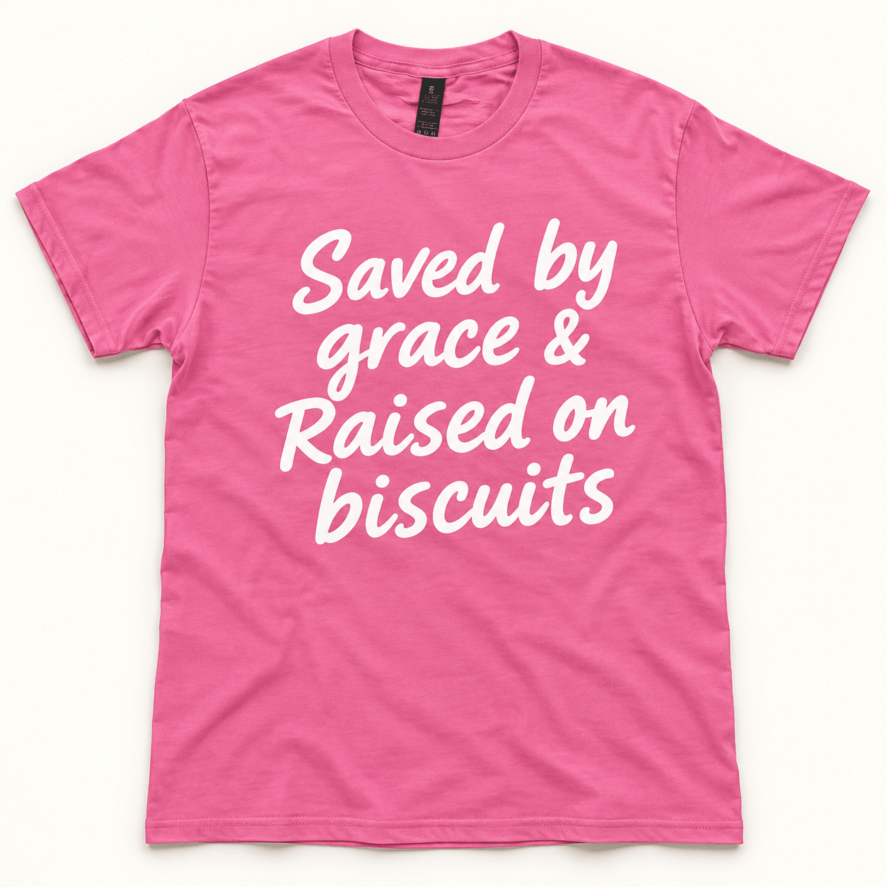 Saved by Grace & Raised on Biscuits T-Shirt – Pink - Mountain Cookin' with Missy