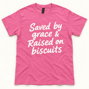 Saved by Grace & Raised on Biscuits T-Shirt – Pink - Mountain Cookin' with Missy